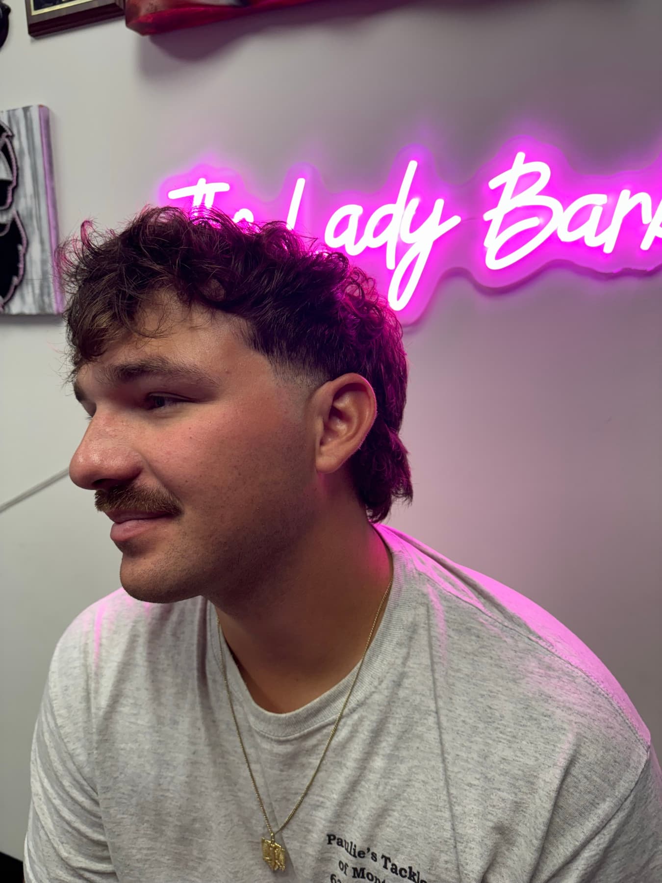 Curly mullet with a taper