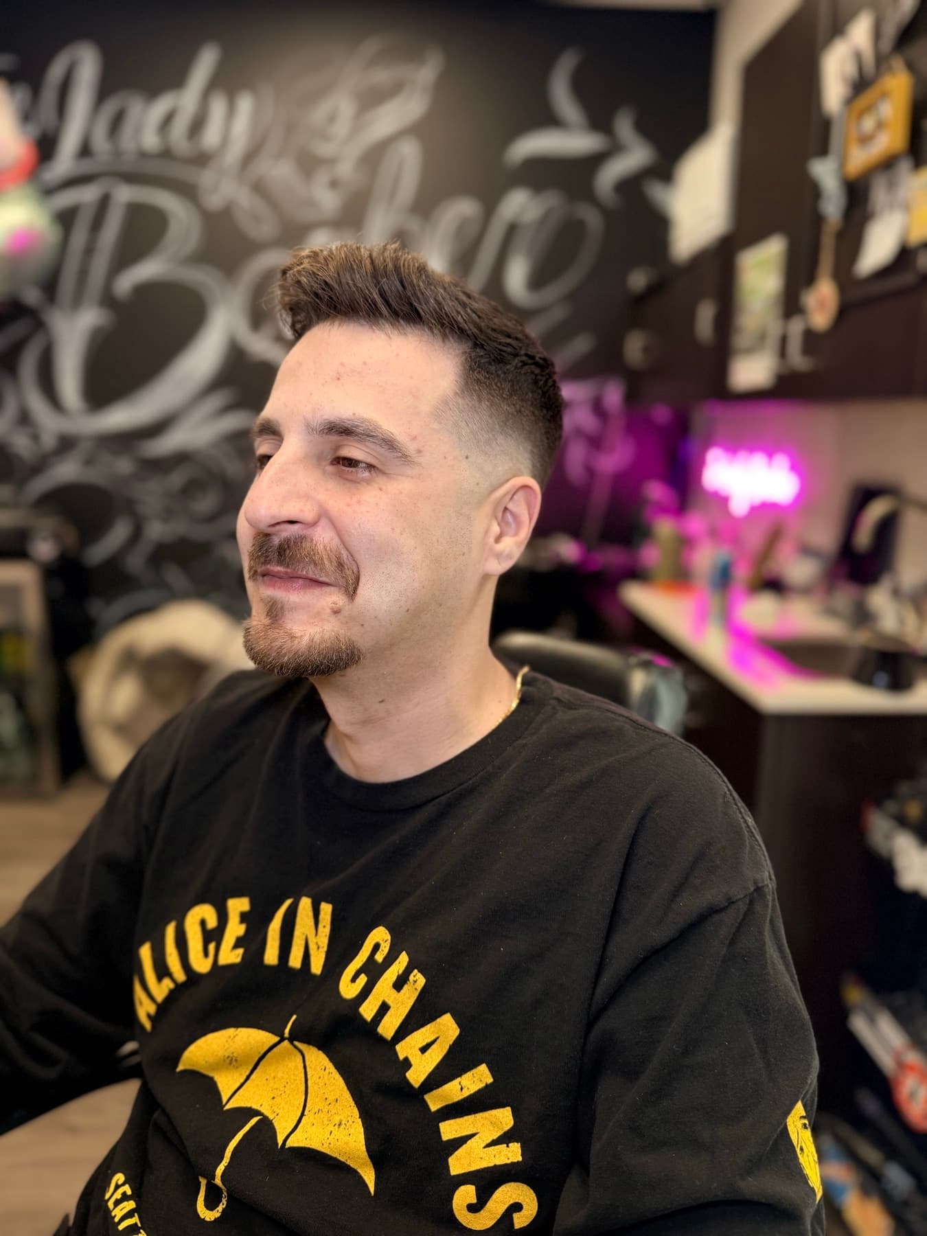 Client with a fresh fade in the shop
